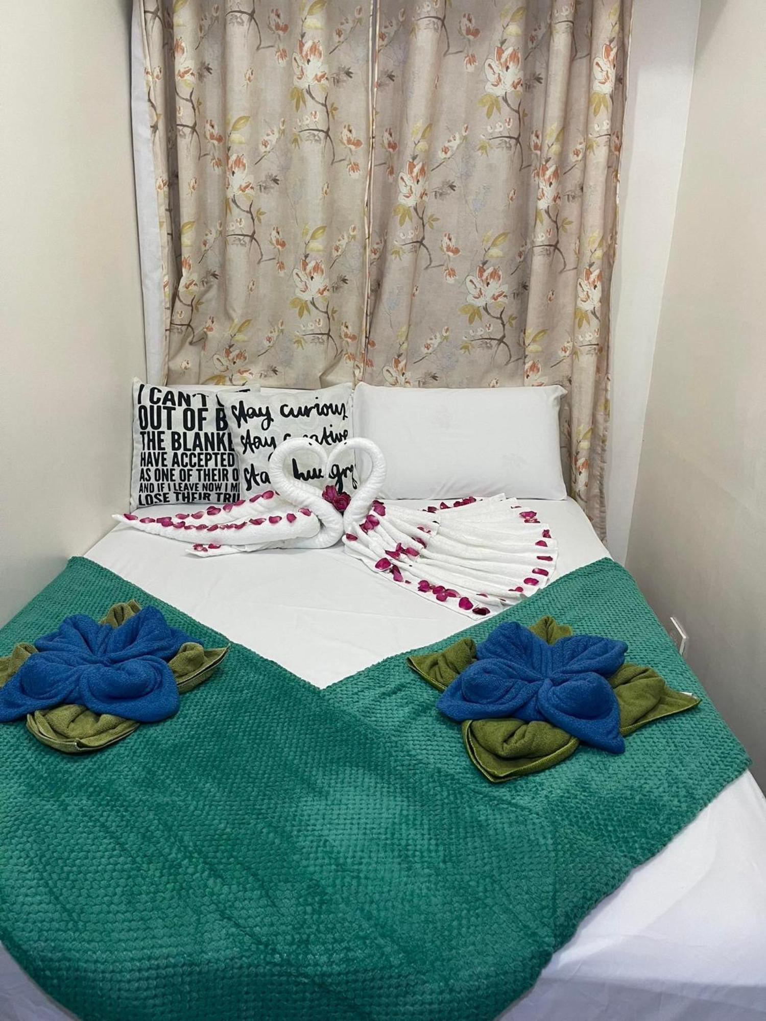 Green Residences Staycation By Pbyy 马尼拉 客房 照片